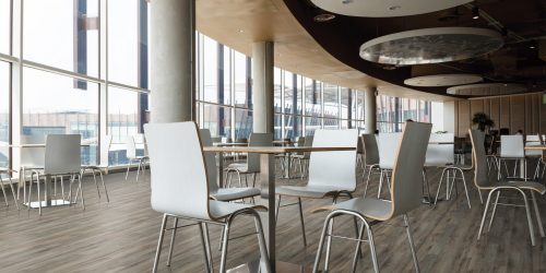 white table and chair in food court